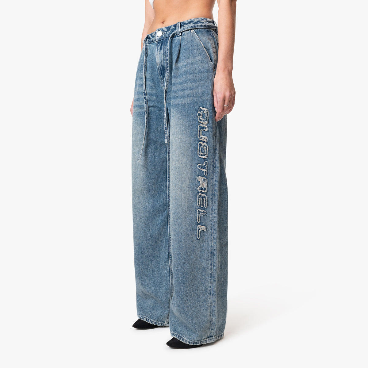 Patched Denim Jeans in vintage blue, front view