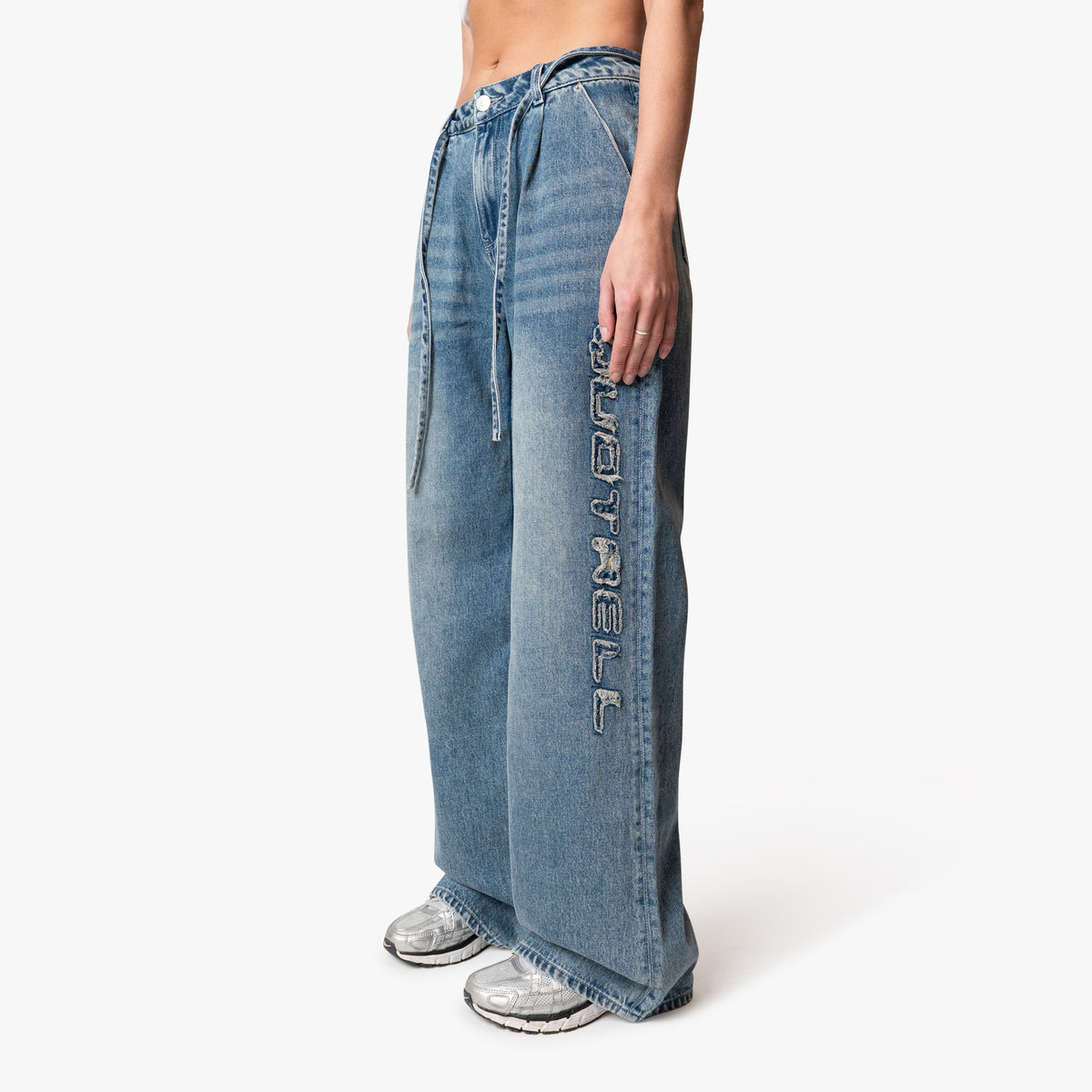 Patched Denim Jeans in vintage blue