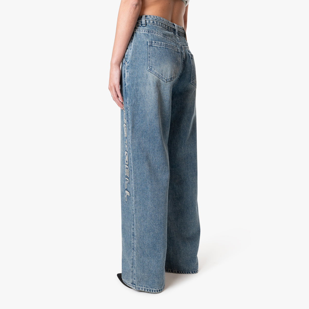 Patched Denim Jeans in vintage blue
