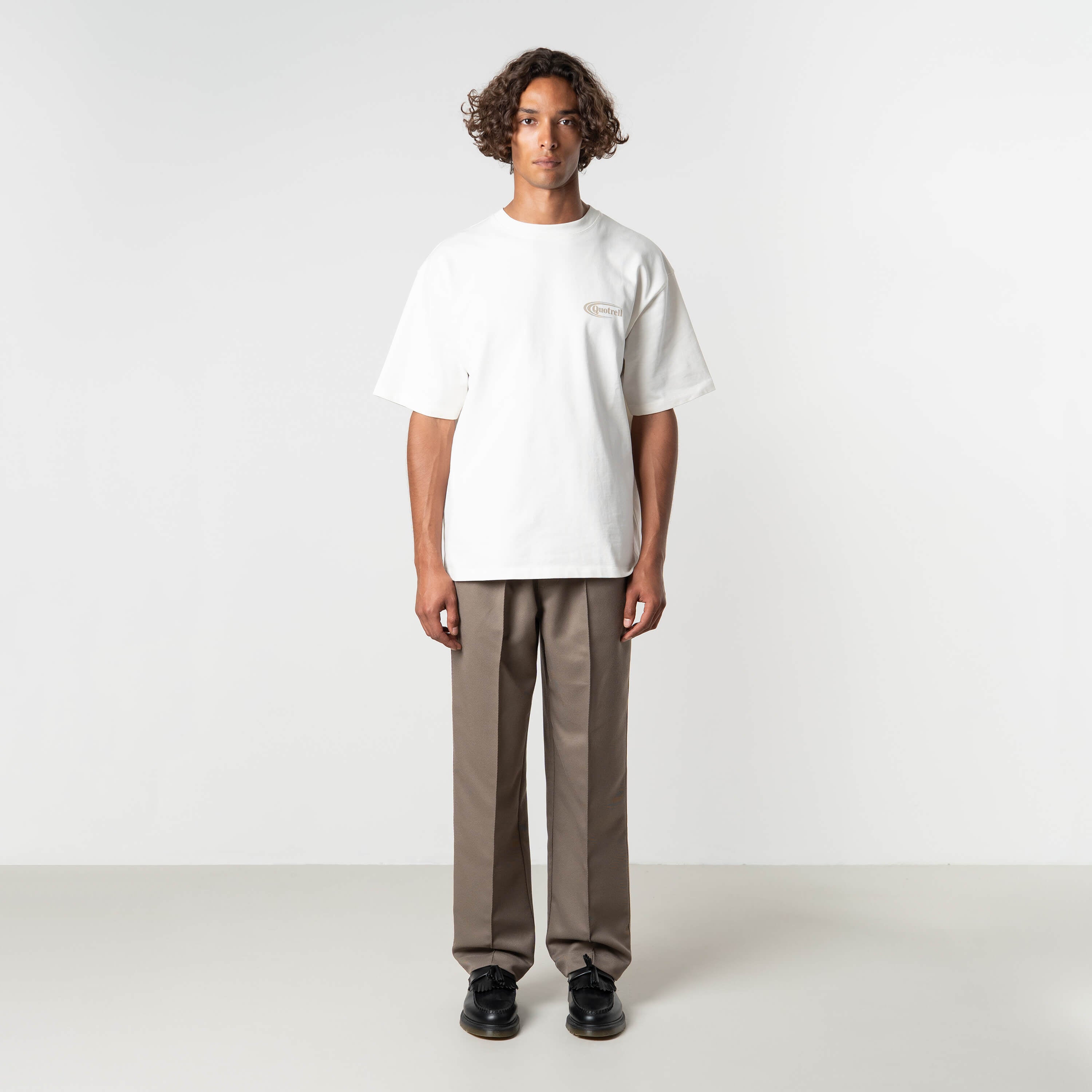 Model is 184 cm, 70 kg, and wears size M